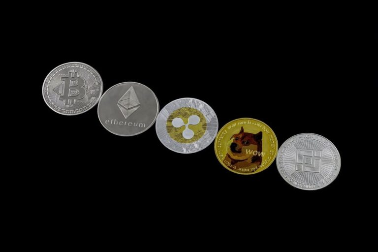 XRP Hits All-Time High as Bitcoin Soars to $119K; Dogecoin & Ethereum Rise